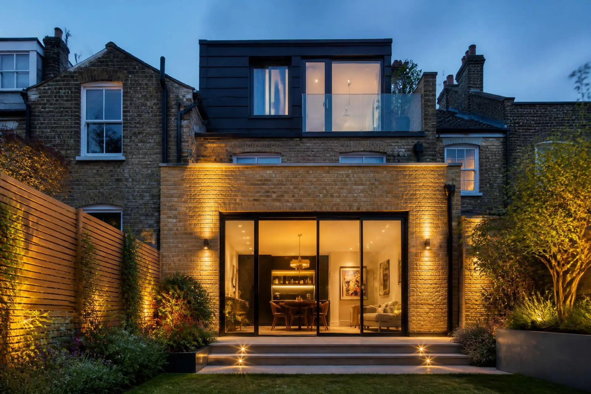Modern London home with loft dormer extension at dusk